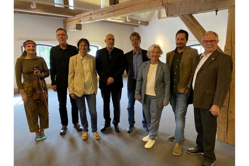 Gruppenfoto der Referentinnen und Referenten sowie Veranstalterinnen und Veranstalter.