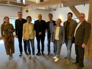 Gruppenfoto der Referentinnen und Referenten sowie Veranstalterinnen und Veranstalter.