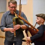 Dudelsackvorführung beim Vortrag über Sackpfeifen.