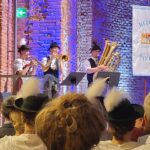 Bläserensemble in Tracht während des musikalischen Programms.